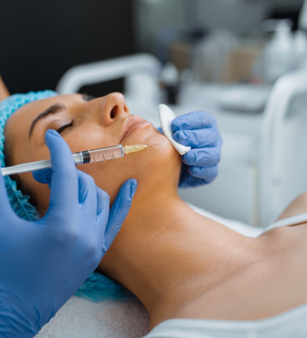 cosmetician-gives-chin-botox-injection-to-patient.jpg cosmetician-gives-chin-botox-injection-to-patient.jpg